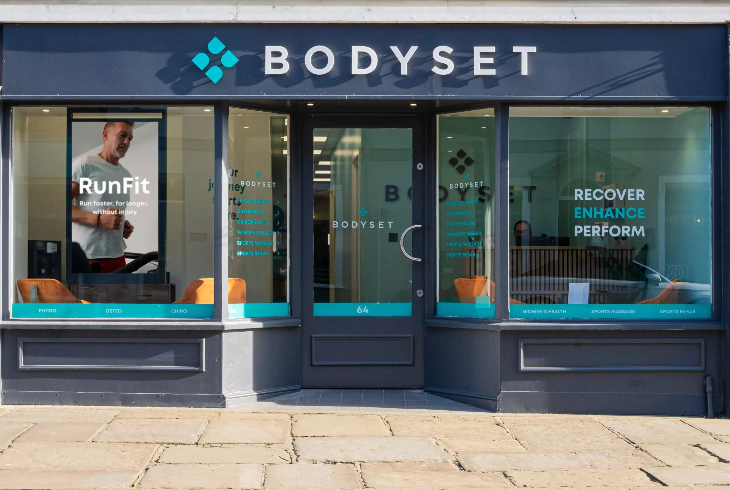 body set storefront with a man in the window
